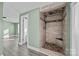 Modern bathroom with a walk-in shower and tile surround at 1325 Bostwood Ln, Concord, NC 28025