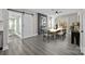 Dining room with sliding doors to deck and modern fireplace at 1325 Bostwood Ln, Concord, NC 28025