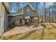 Backyard with patio, pergola, fire pit and house at 14264 Maple Hollow Ln, Mint Hill, NC 28227