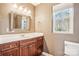 Bathroom with single vanity, shower and window at 14264 Maple Hollow Ln, Mint Hill, NC 28227