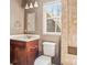 Small bathroom with vanity, toilet and shower at 14264 Maple Hollow Ln, Mint Hill, NC 28227