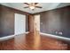 Spacious bedroom with wood floors and double closets at 14264 Maple Hollow Ln, Mint Hill, NC 28227