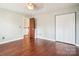 Spacious bedroom with wood floors and double closets at 14264 Maple Hollow Ln, Mint Hill, NC 28227