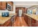 Kitchen with stainless steel appliances and granite countertops at 14264 Maple Hollow Ln, Mint Hill, NC 28227