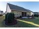 House exterior with screened porch and landscaped backyard at 14310 Cameryn Elise Dr, Cornelius, NC 28031