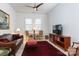 Relaxing home office featuring a leather couch and built-in shelving at 14310 Cameryn Elise Dr, Cornelius, NC 28031