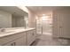 Bathroom boasts double vanity and large shower at 14509 Winged Teal Rd, Charlotte, NC 28278