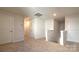 Upstairs hallway with carpet and multiple doors at 14509 Winged Teal Rd, Charlotte, NC 28278