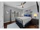 Bright bedroom with a comfortable bed and plenty of natural light at 15903 Glen Miro Dr, Huntersville, NC 28078