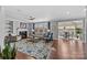 Living room with fireplace and hardwood floors at 15903 Glen Miro Dr, Huntersville, NC 28078