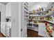 Large walk-in pantry with ample shelving for storage at 15903 Glen Miro Dr, Huntersville, NC 28078