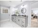 Elegant bathroom with double vanity, granite countertops, and modern fixtures at 1938 Grace Ln, Charlotte, NC 28262