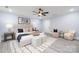 Large bedroom with a king-size bed, neutral decor, and ample space at 1938 Grace Ln, Charlotte, NC 28262