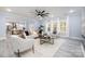 Light-filled living room, open to kitchen and dining areas at 1938 Grace Ln, Charlotte, NC 28262