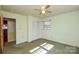 Light green bedroom with ceiling fan and carpet at 194 Bynum Rd, Lincolnton, NC 28092