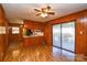 Dining area with wood paneling and kitchen pass-through at 194 Bynum Rd, Lincolnton, NC 28092