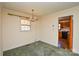 Dining area with carpet flooring and chandelier at 194 Bynum Rd, Lincolnton, NC 28092