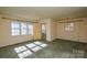 Bright living room with large windows and a view of the front yard at 194 Bynum Rd, Lincolnton, NC 28092