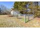 Small storage shed in backyard with chain link fence at 194 Bynum Rd, Lincolnton, NC 28092