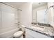 Clean bathroom featuring a granite vanity and a shower/tub combo at 205 Benfield Rd, Kings Mountain, NC 28086