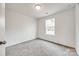 Well-lit bedroom featuring grey carpet and a window at 205 Benfield Rd, Kings Mountain, NC 28086