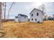 Rear view of two-story home with spacious yard at 205 Benfield Rd, Kings Mountain, NC 28086