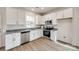 Modern kitchen with white cabinets and granite counters at 205 Benfield Rd, Kings Mountain, NC 28086