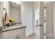 Clean bathroom with granite vanity and a mirror at 207 Benfield Rd, Kings Mountain, NC 28086