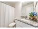 Bathroom with white vanity, granite countertop and shower at 207 Benfield Rd, Kings Mountain, NC 28086