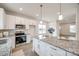 Modern kitchen with granite countertops and stainless steel appliances at 207 Benfield Rd, Kings Mountain, NC 28086