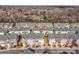 Aerial view of townhomes with garages and landscaping, skyline in the distance at 2151 Belle Vernon Ave, Charlotte, NC 28210