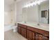 Bathroom with double vanity and shower/tub combo at 2151 Belle Vernon Ave, Charlotte, NC 28210