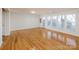 Bright bonus room featuring gleaming hardwood floors and lots of natural light at 2151 Belle Vernon Ave, Charlotte, NC 28210