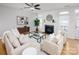 Cozy living room features neutral tones, fireplace, and lots of natural light at 2151 Belle Vernon Ave, Charlotte, NC 28210