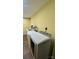 Efficient laundry room with modern washer and dryer units for convenient chores at 217 Ruby Ln, Gastonia, NC 28054