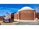 Schiele Museum is a natural history museum with a planetarium under a bright blue sunny sky at 217 Ruby Ln, Gastonia, NC 28054