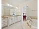 Spa-like Primary bathroom with soaking tub and double vanity at 2823 Providence Rd # 252, Charlotte, NC 28211