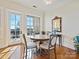 Bright dining area with hardwood floors and access to balcony at 2823 Providence Rd # 252, Charlotte, NC 28211