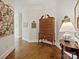 Bright hallway with hardwood floors and antique furniture at 2823 Providence Rd # 252, Charlotte, NC 28211