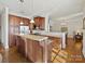 Island kitchen with granite countertops and stainless steel appliances at 2823 Providence Rd # 252, Charlotte, NC 28211