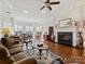 Sunlit living room with hardwood floors and fireplace at 2823 Providence Rd # 252, Charlotte, NC 28211