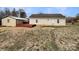 Backyard view showing a detached shed and wooden deck at 3164 River Rd, Lincolnton, NC 28092