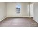 Spacious bedroom with neutral walls and plush carpeting at 3164 River Rd, Lincolnton, NC 28092