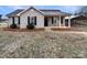 Charming one-story house with stone accents and a covered porch at 3164 River Rd, Lincolnton, NC 28092