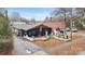 Aerial view of commercial building with parking and outdoor seating at 319 Bezelle Ave, York, SC 29745