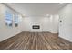 Spacious living room with hardwood floors and a modern fireplace at 319 Bezelle Ave, York, SC 29745