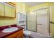 Bathroom featuring a shower, vanity and toilet at 33287 Mann Rd, Albemarle, NC 28001