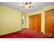 Bedroom featuring a window, closet and carpeted floors at 33287 Mann Rd, Albemarle, NC 28001