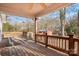 Wooden deck overlooks backyard with trees and shed at 3515 Back Creek Church Rd, Charlotte, NC 28213