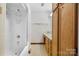 Clean bathroom with shower/tub and wood cabinets at 3910 6Th Nw St, Hickory, NC 28601